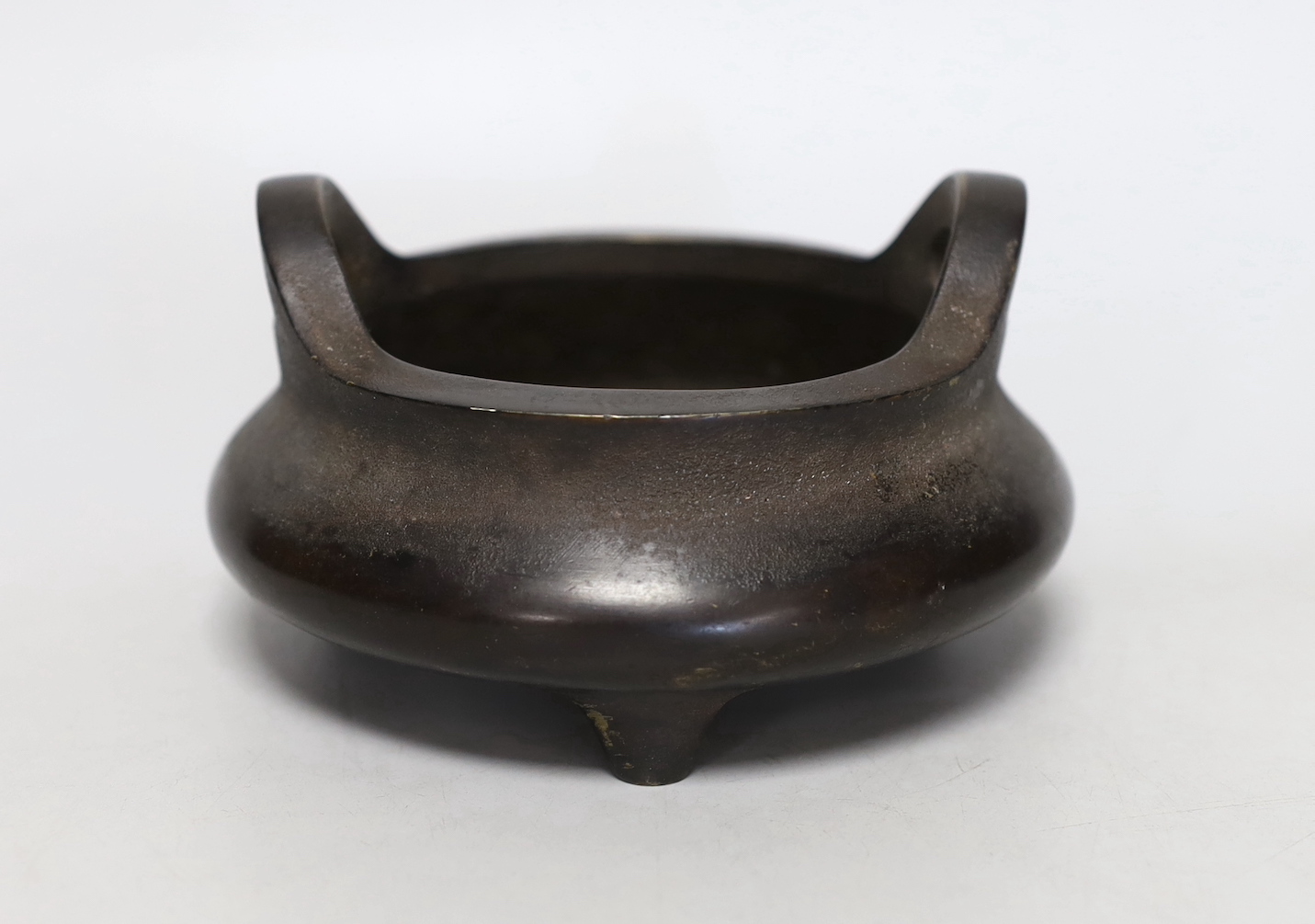 A Chinese bronze censer, ding, 8cm tall